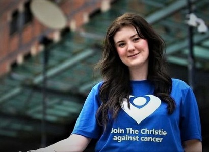 A photo of former Christie patient and Christie Charity supporter Lea Abell in a Christie Charity t-shirt.
