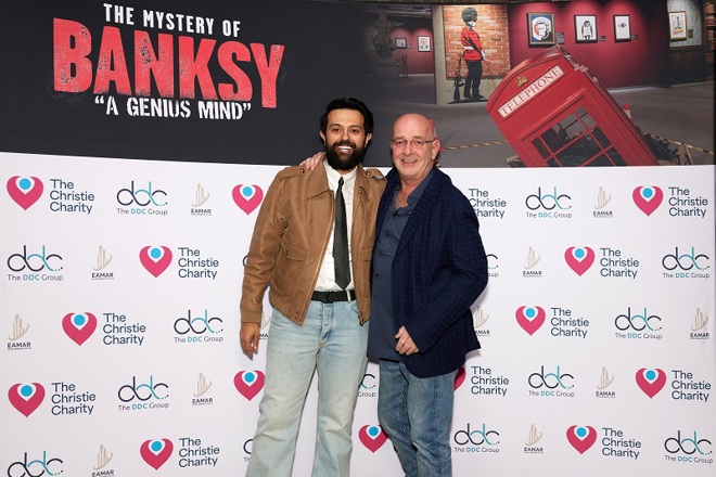 A photo of Jan Trevalyan, DDC Group Chairman and Co-Founder with Dr Abdullah Bin Saleh Alnaeem, Chairman and Philanthropist at Eamar Developments (UK) Ltd  at The Mystery of Banksy – A Genius Mind exhibition.