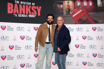 A photo of Jan Trevalyan, DDC Group Chairman and Co-Founder with Dr Abdullah Bin Saleh Alnaeem, Chairman and Philanthropist at Eamar Developments (UK) Ltd at The Mystery of Banksy – A Genius Mind exhibition.