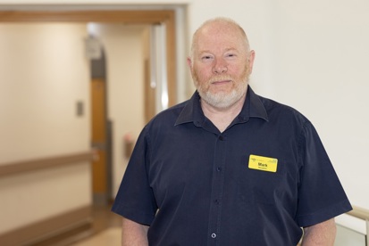 A photo of Mark Hillman, receptionist in the blood room at The Christie.