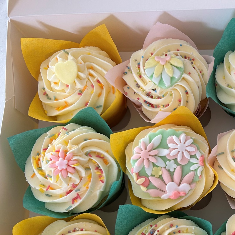 A photo of 4 cupcakes.