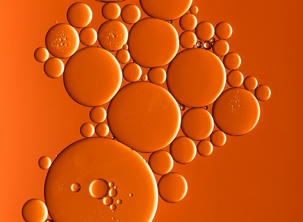 An orange graphic showing some bubbles.