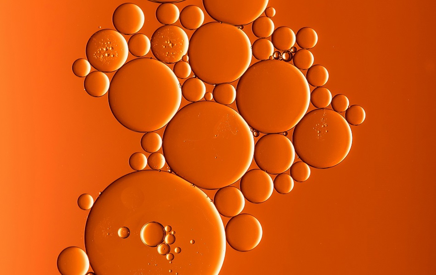 An orange graphic showing some bubbles.