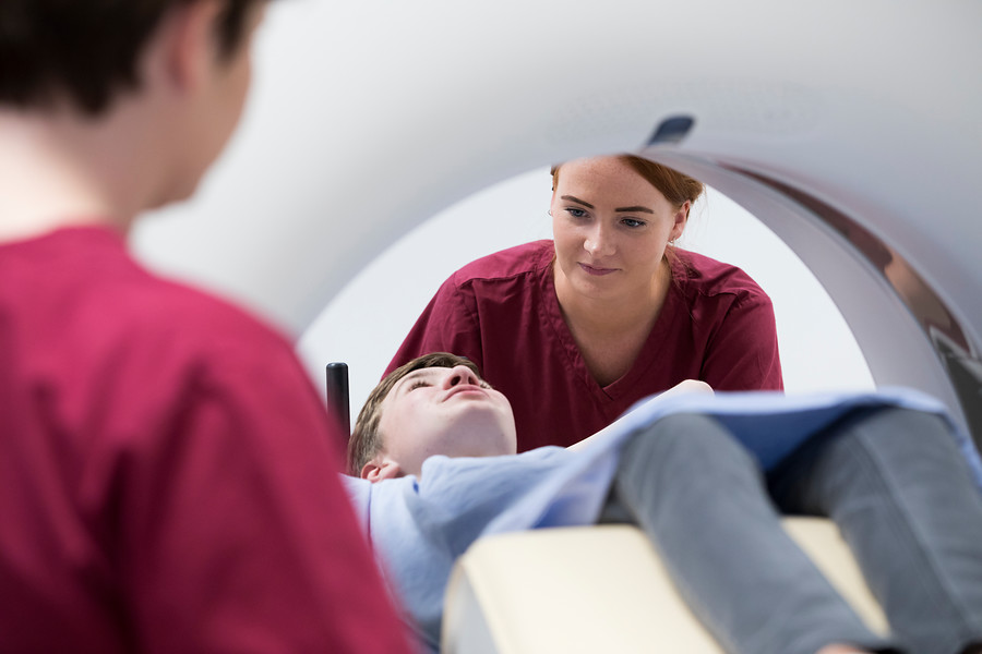 Radiographer, Jen Walters, February 2021, child patient, Liam Hughes, patient scan, proton beam therapy, PBT