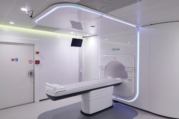 A photo of the Elekta MR-linac scanner and radiotherapy treatment machine.