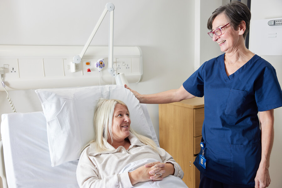 Nurse next to patient in bed, Clinical research facility, CRF manager, Helen Donovan, Pan Artists, Lesley Gray, November 2022