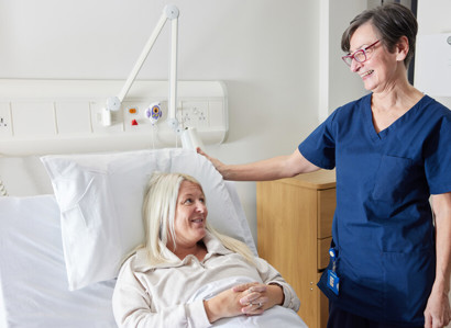 Nurse next to patient in bed, Clinical research facility, CRF manager, Helen Donovan, Pan Artists, Lesley Gray, November 2022