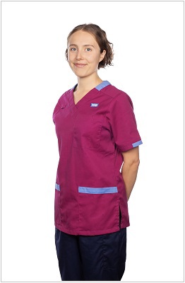 A photo of a dietitian wearing a uniform in ruby with light blue trim.