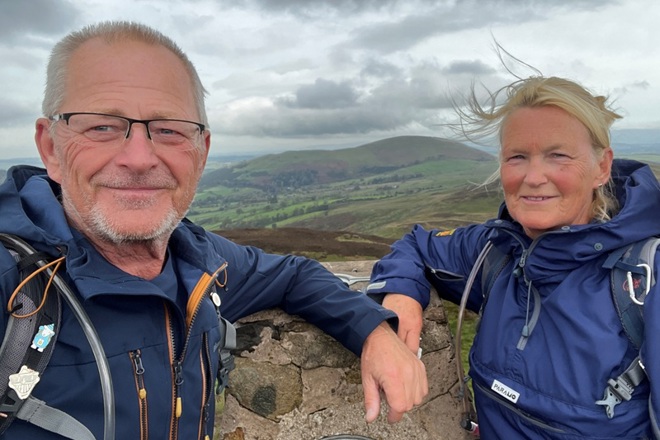 A photo of Christie patient Mark and his partner Debbie on a hike.