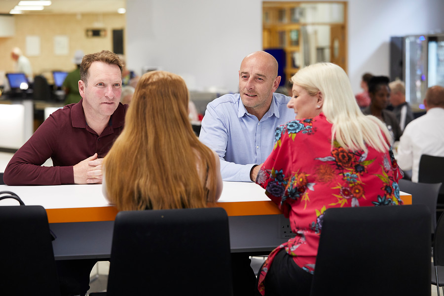 Pan Artists, patients talking, restaurant