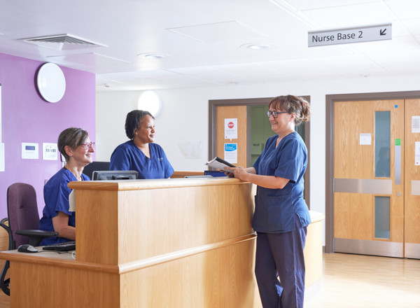 Clinical research facility, nurses station, September 2022, Helen Donovan, ward manager, Florence Niyindagiye, clinical research nurse, Alison Barton