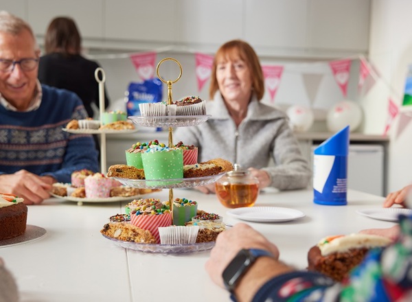 A photo of a group of Christie Charity fundraisers having afternoon tea.