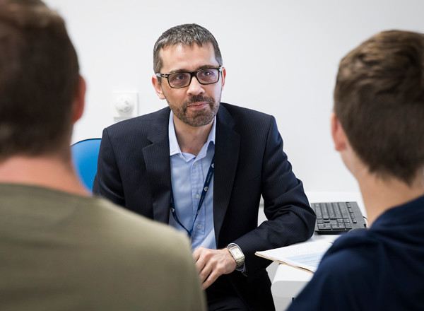 patient and doctor, consultation, TYA, young patient, teenage, protons, proton beam therapy, PBT, Dr Ed Smith, May 2022