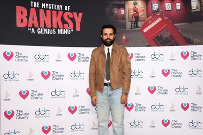 A photo of Dr Abdullah Bin Saleh Alnaeem, Chairman and Philanthropist at Eamar Developments (UK) Ltd at The Mystery of Banksy – A Genius Mind exhibition.