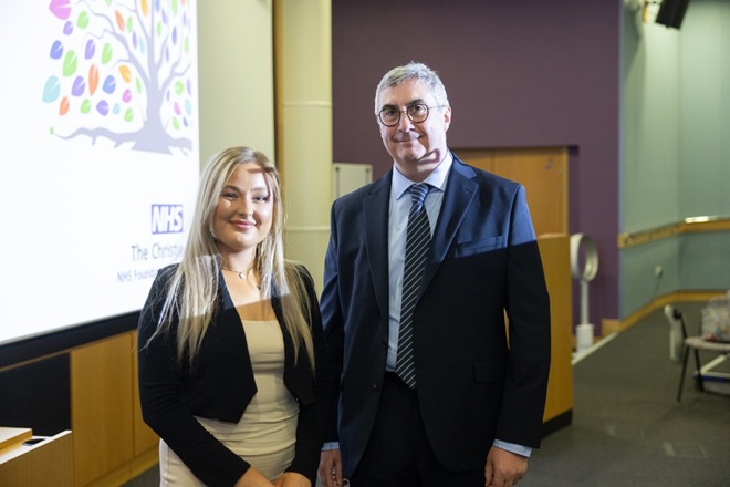 A photo of Christie patient Olivia with The Christie's chief executive Roger Spencer.