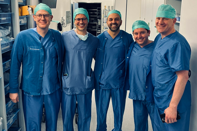 A photo of Christie urology surgeons Mr Arie Parnham, Mr Jeremy Oates, and Mr Aziz Gulamhusein, together with penile cancer fellow Kenneth Patterson visiting a former fellow in Switzerland to see how his practice has evolved.