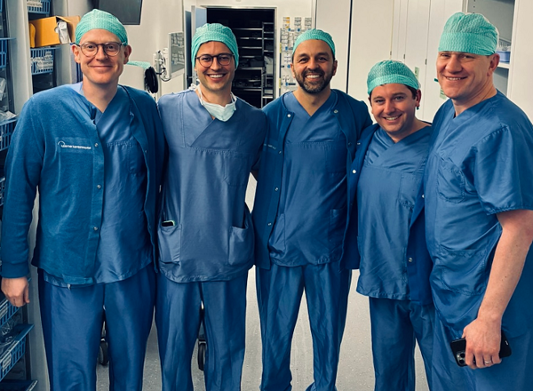 A photo of Christie urology surgeons Mr Arie Parnham, Mr Jeremy Oates, and Mr Aziz Gulamhusein, together with penile cancer fellow Kenneth Patterson visiting a former fellow in Switzerland to see how his practice has evolved.