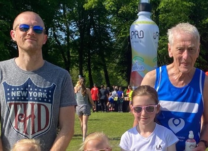 A photo of Christie fundraiser Mike Barnes, his son-in-law Mark and his 3 granddaughters, Sophie, Naomi and Heidi in a park after a run.