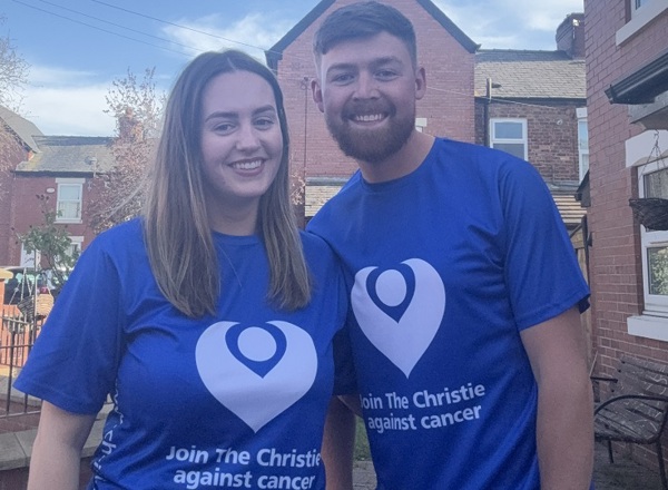A photo of Leah with her boyfriend, Kieran - they are both wearing Christie Charity t-shirts reading 'Join The Christie against cancer'.