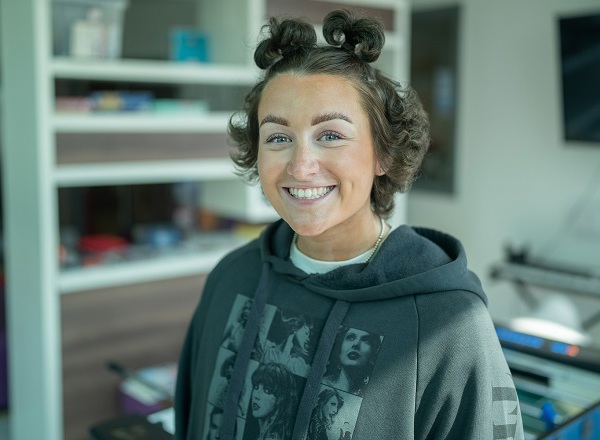 A photo of Christie patient Claudia Boardman wearing a Taylor Swift hoodie.