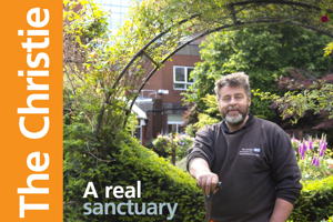 A photo of a man standing in The Christie garden. Text along the left-hand side reads 'The Christie' and text at the bottom of the image reads 'A real sanctuary'.