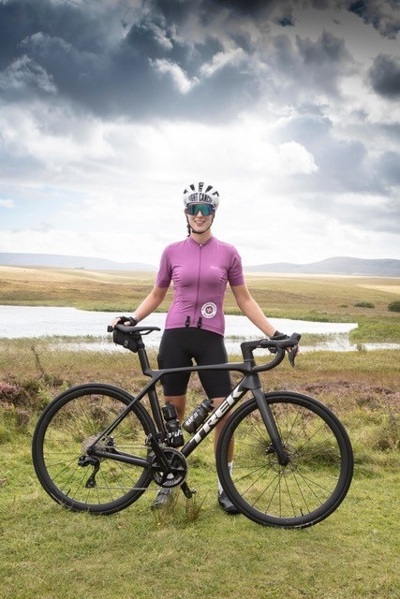 A photo of Christie patient Bex Hind with a bike.