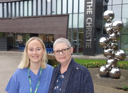A photo of clinical nurse specialist Sophie Maycock with her patient Libby Holden outside The Christie NHS Foundation Trust.