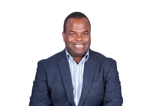 A photo of Dr Peter Mbanu.