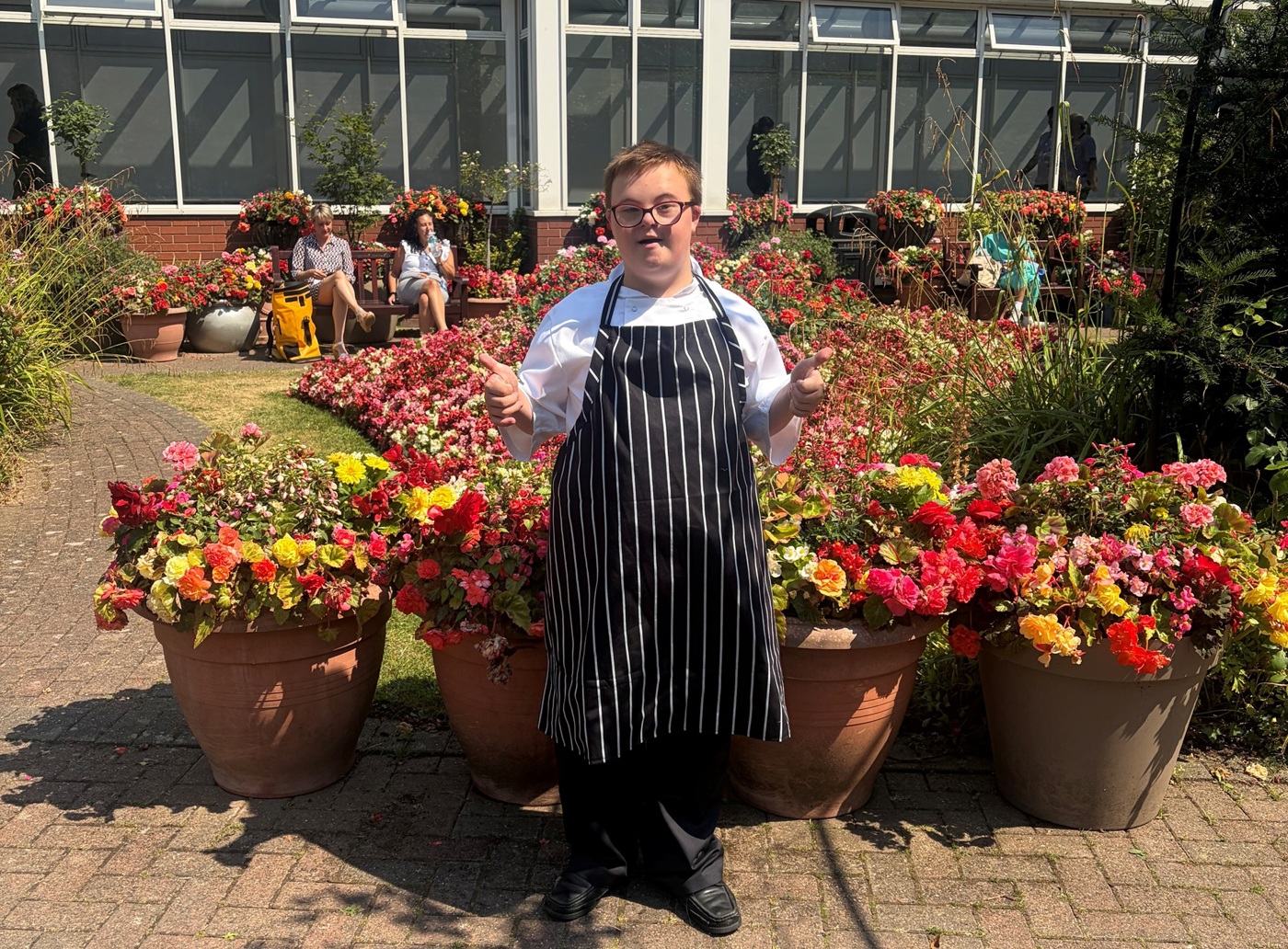 A photo of Christie work experience student Theo in The Christie garden.