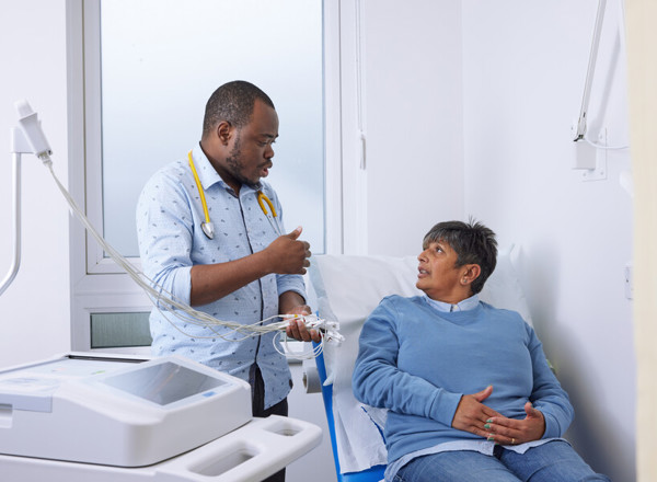 clinical research facility, patient and doctor, consultation, Pan Artists, September 2022,Lalini Carter, Dr Umar Abdullah, Clinical Fellow, ECMT.