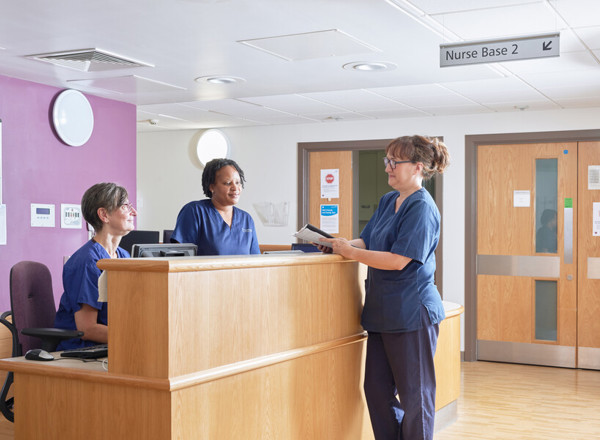 Clinical research facility, nurses station, September 2022, Helen Donovan, ward manager, Florence Niyindagiye, clinical research nurse, Alison Barton